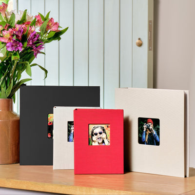 Kenro Aztec photo albums displayed on a table in grey, red and black options