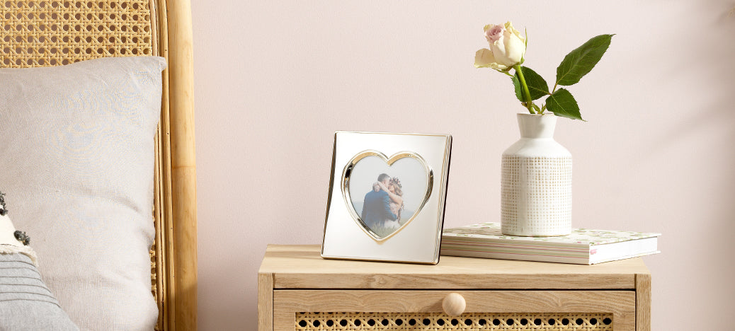 silver plated heart frame with wedding photograph